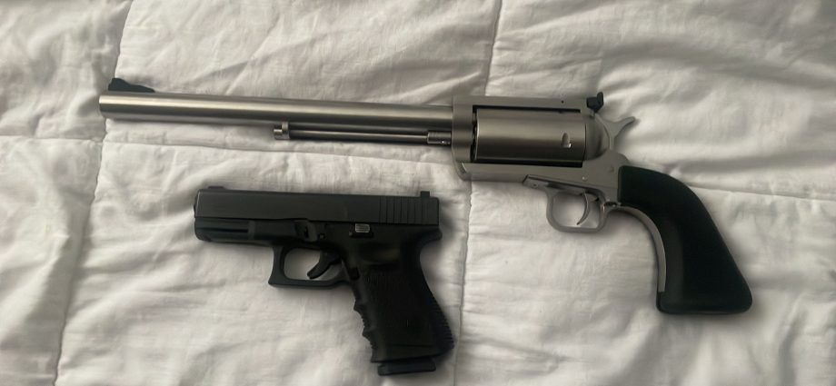r/guns - Christmas came early. My new Magnum Research BFR .444 Marlin next to my Glock 19.